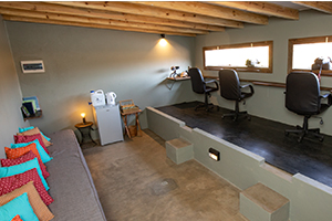 Inside the photo hide with chairs and power